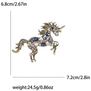 Elegant Gold Unicorn Brooch with Gemstones